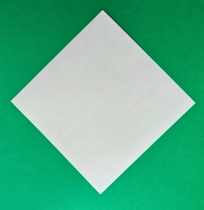 Place your square paper like a diamond shape on the table