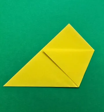 Fold the right corner diagonally