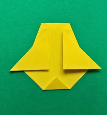 Fold the bottom corner up just a little