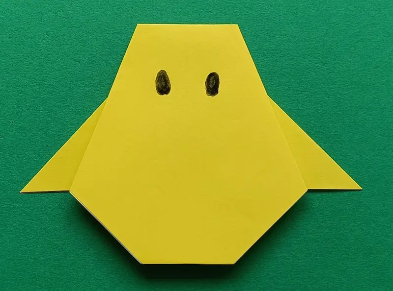 Draw both eyes with a marker