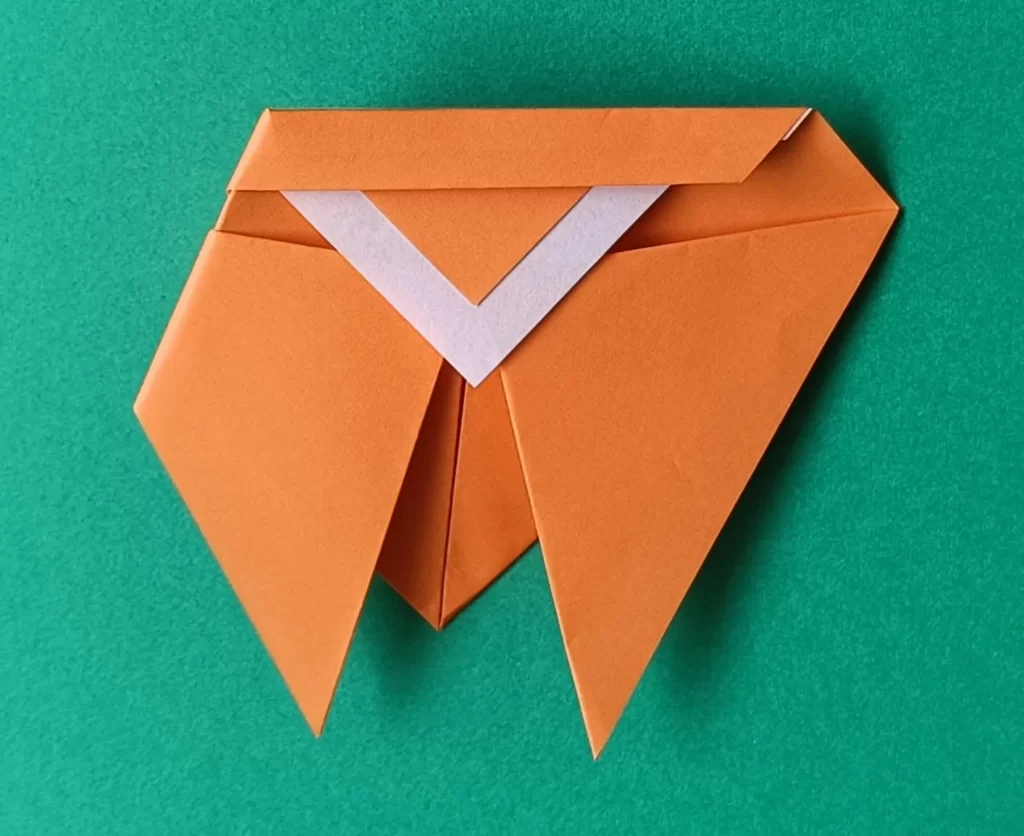 Fold the left corner backward