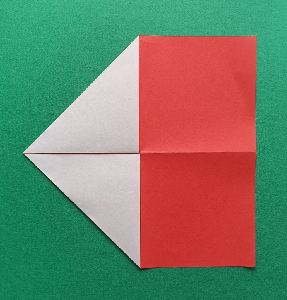 Fold the top left corner to the middle