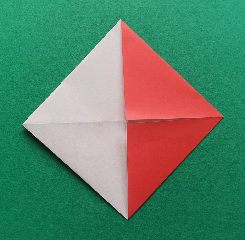 Fold the top right corner to the middle