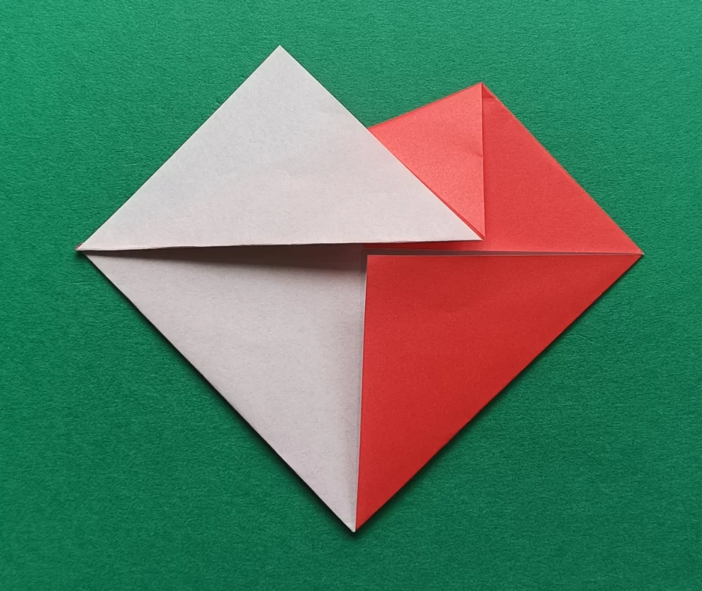 Fold the top left to the middle