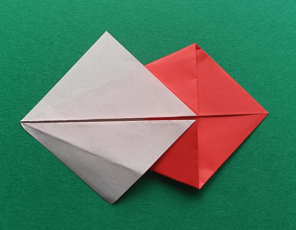 Fold the bottom left to the middle