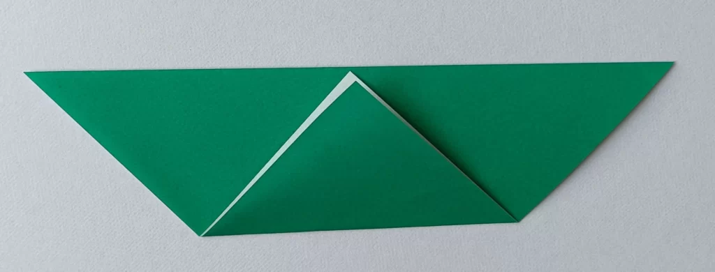 Fold the bottom corners up