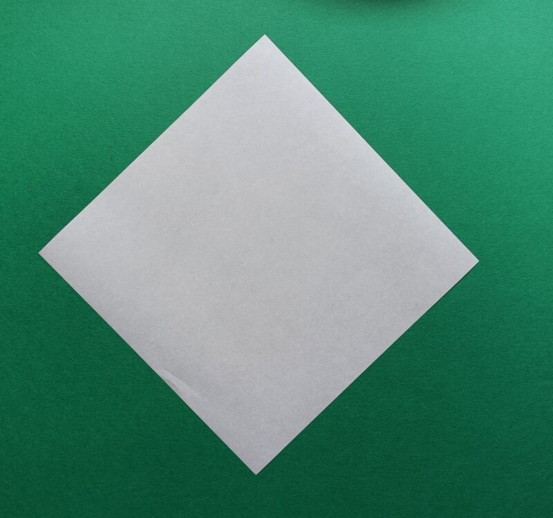Place your square paper on the table like a diamond