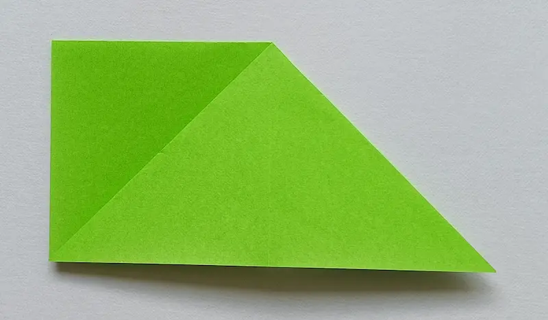 Open the pocket and flatten it to make a triangle