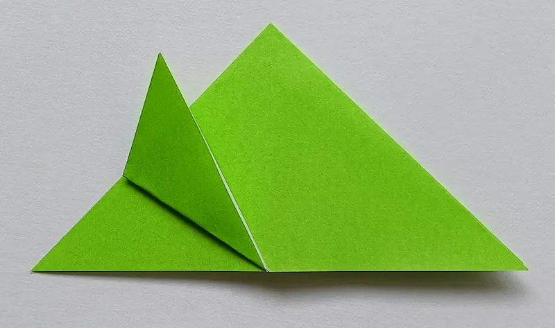 Fold only the top layer's left corner up