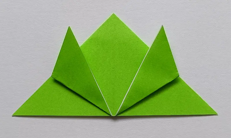 Fold only the top layer's right corner up