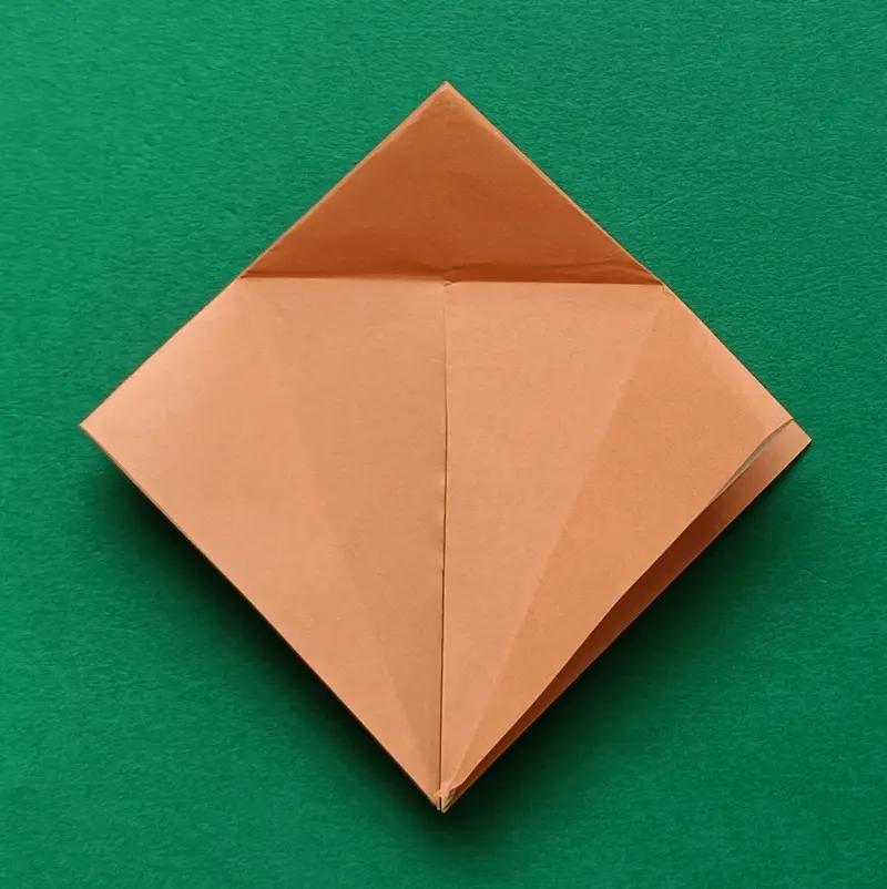 Cut from the bottom corner to the sideline. (Only the top layer!)