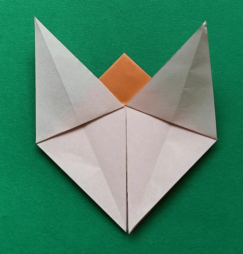 Open both sides into a diamond shape