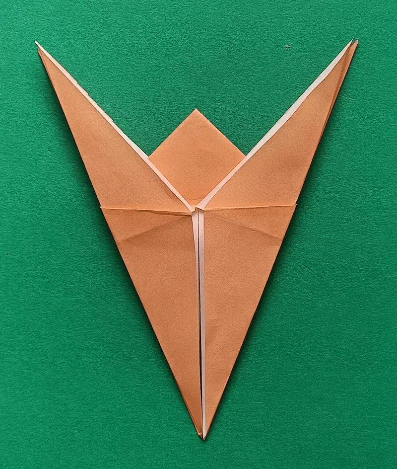 Fold the diamonds on both sides in half