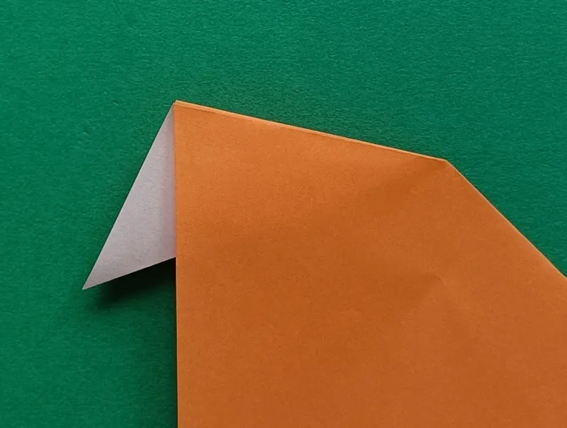 Flatten the paper carefully