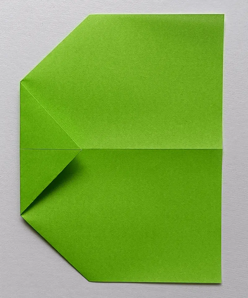 Fold the left corner to the right