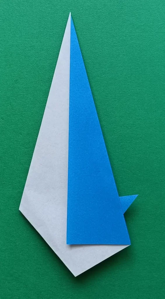 Make an inside reverse fold along the crease for the tail