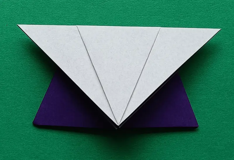 Fold the bottom corner to the back