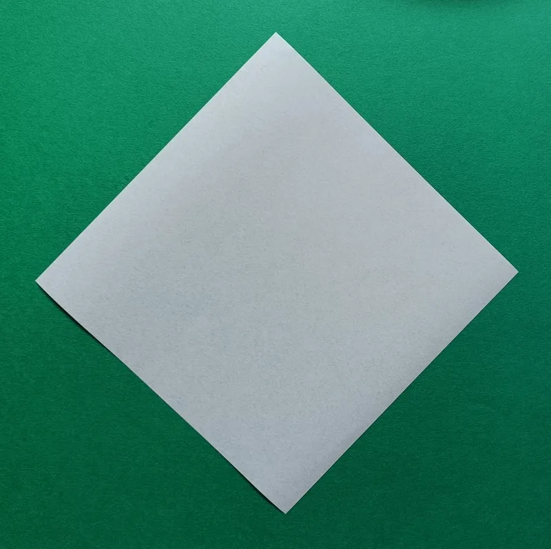 Place your square paper on the table like a diamond