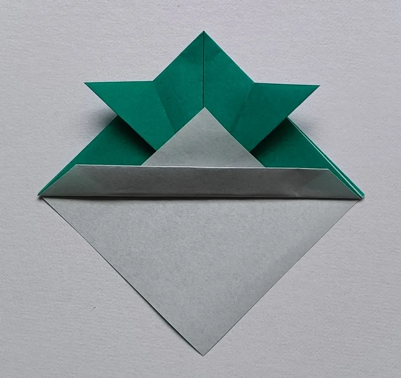 Fold the same bottom edge up again to make a band