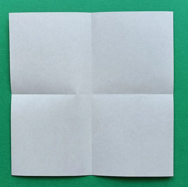 Make a cross shape with folds