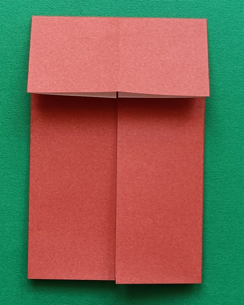 Fold the top side to meet the center line