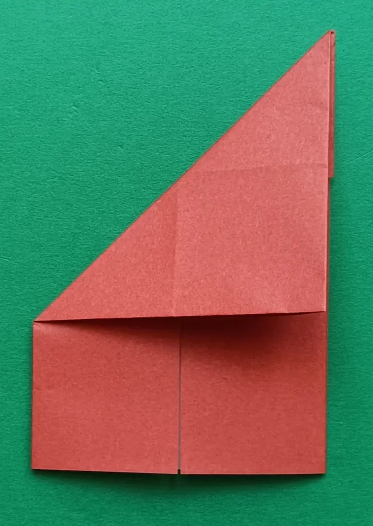 Fold the top-left corner to the right edge