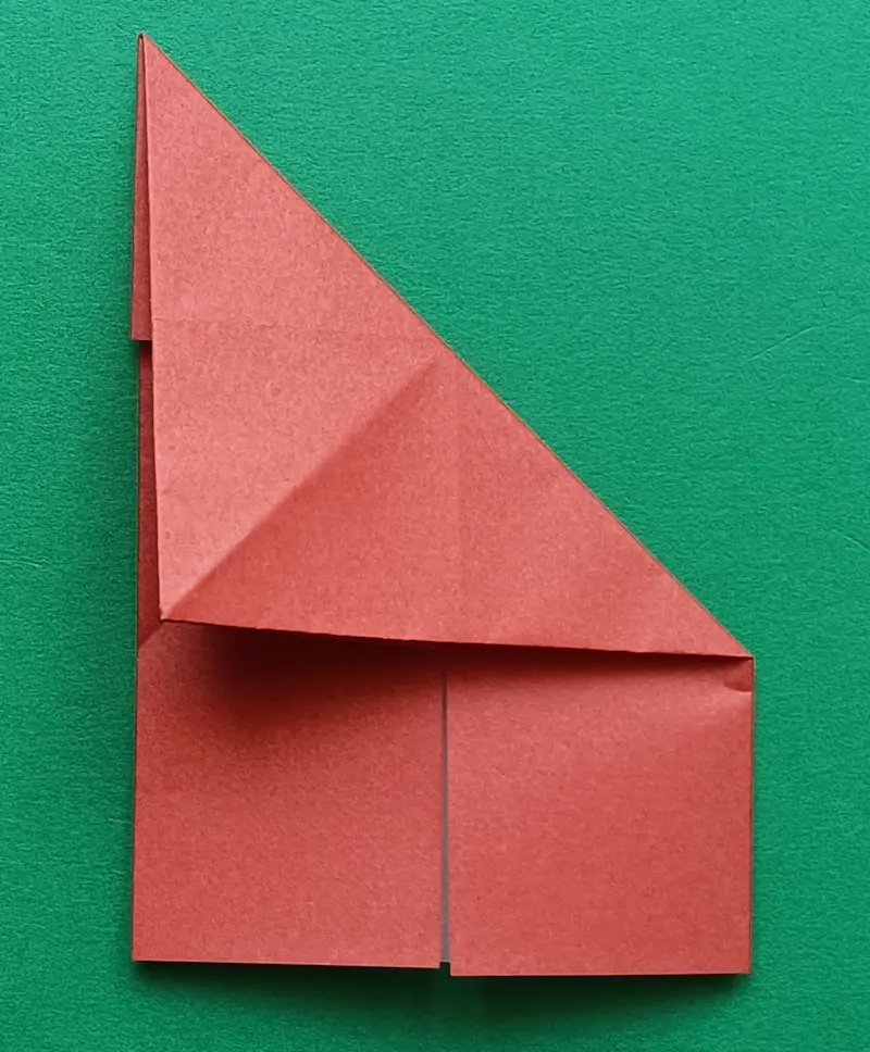Fold the top-right corner to the left edge