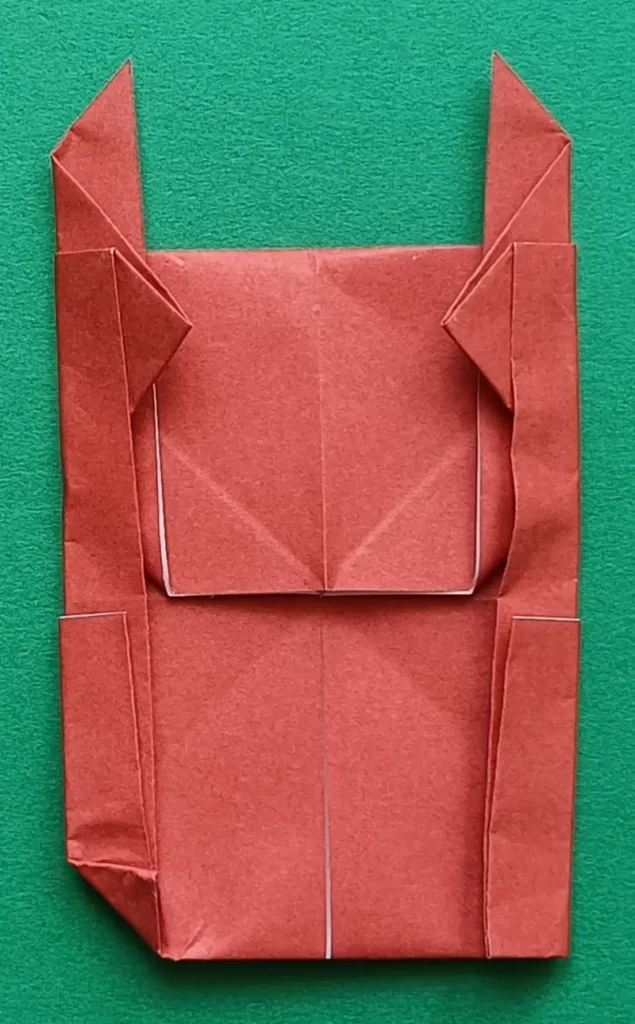 Fold the bottom-left corner a little bit