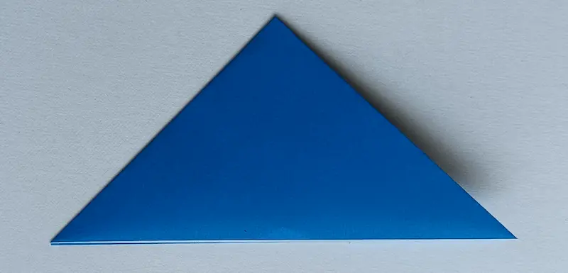 Fold the triangle in half again