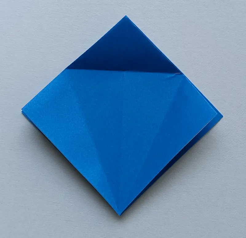 Make three crease lines like in the picture