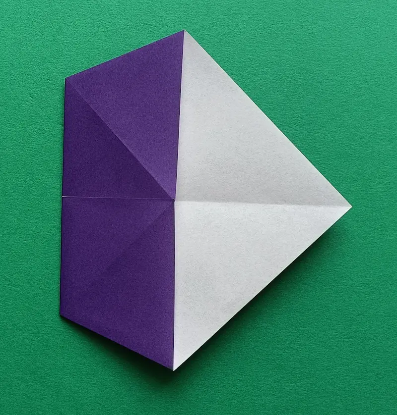 Fold the left corner over to meet the right corner