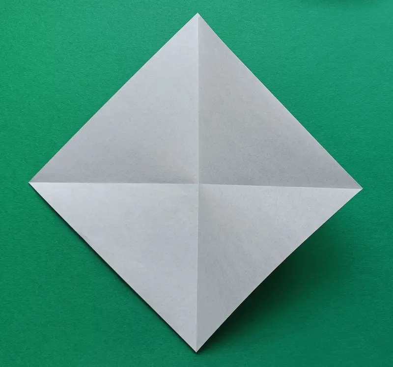 Make two diagonal creases by folding and unfolding