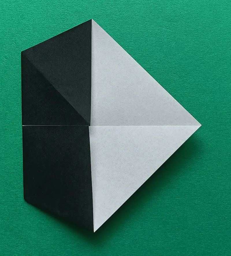 Fold the left corner over to meet the right corner