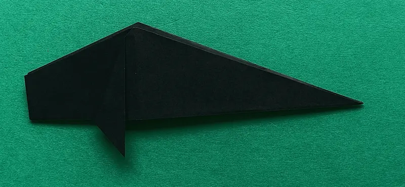 Fold the fin down. (Do the same on the back.